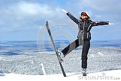 Young smiley woman skier Stock Photo