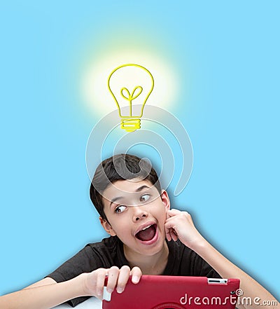 Young smiling boy with one hand resting on cheek with speech bubble against blue background Stock Photo