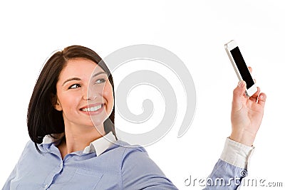 Young smiling brunette woman taking a selfie Stock Photo