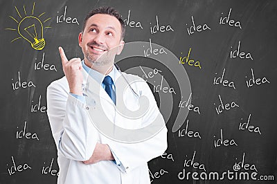 Young smiling medic being creative and having a good idea Stock Photo