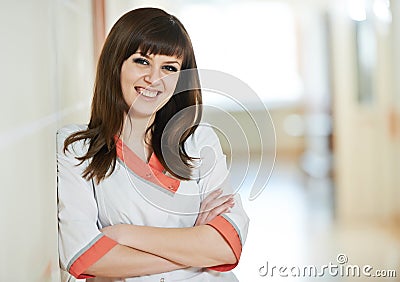 Young happy medic nurse in hospital Stock Photo