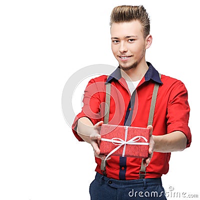 Young smiling vintage man holding gift Stock Photo