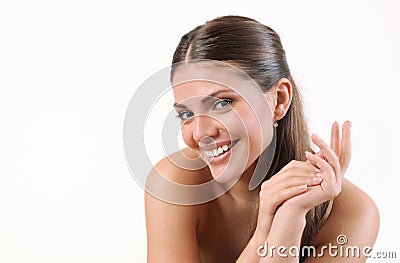 young smiling woman with pure skin and strong healthy bright hair Stock Photo