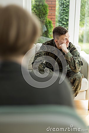 Young soldier with depression Stock Photo
