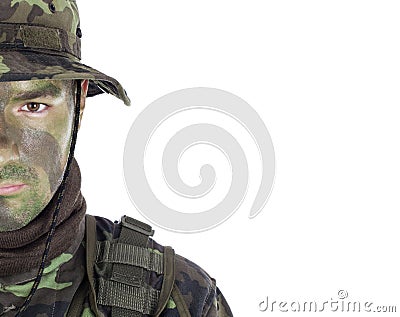 Young soldier with jungle camouflage paint. Stock Photo