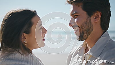 Young soulmates standing ocean beach enjoying family weekend close up. Love date Stock Photo
