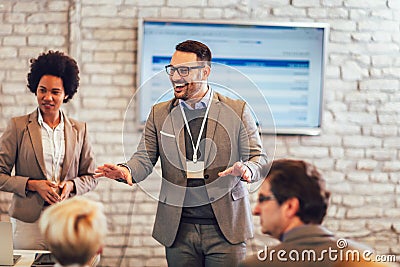 Speaker giving a talk in conference hall at business event Stock Photo