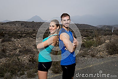 Young sport couple posing shoulder to shoulder looking cool and defiant attitude Stock Photo