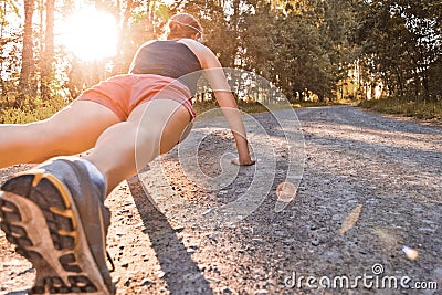 Young sport woman does pushups Stock Photo
