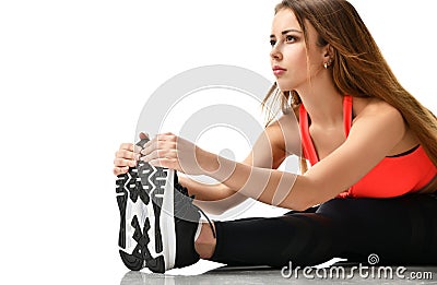 Young sport woman gymnastics doing stretching fitness exercise workout isolated on a white Stock Photo