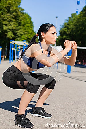 Young sportive female on sport playground Stock Photo