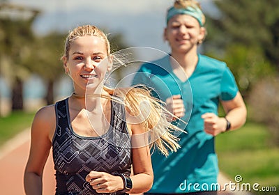 Young sporty people on jogging Stock Photo