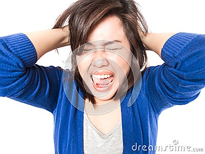 Young stress woman going crazy pulling her hair in frustration o Stock Photo