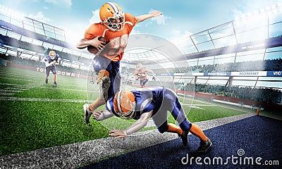 Young and strong american football players on green grass Stock Photo