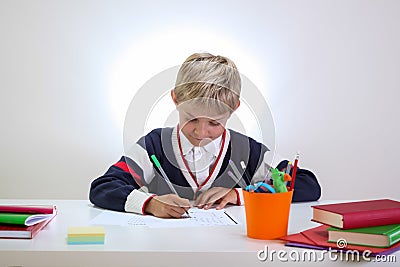 Young student doing his homework Stock Photo