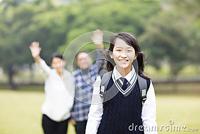 Young student girl with parent in school Stock Photo