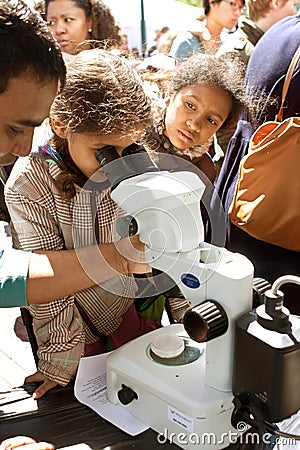 Young Student Looks Through Digital Microscope At Atlanta Science Fair Editorial Stock Photo