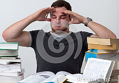 Young Student overwhelmed with studying Stock Photo