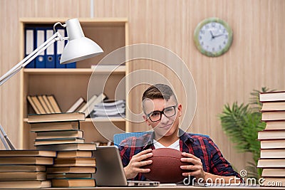 The young student preferring playing baseball to studying Stock Photo