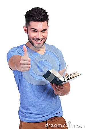 Young student reading a good book Stock Photo