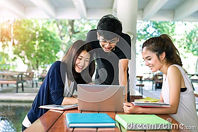 Young Students Group Consult with School Folders Stock Photo