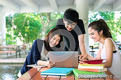 Young Students Group Consult with School Folders Stock Photo