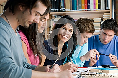 Young students studying in a library Stock Photo