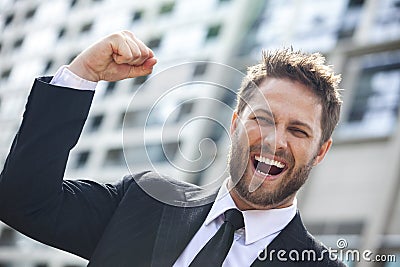 Young Successful Business Man Celebrating in City Stock Photo