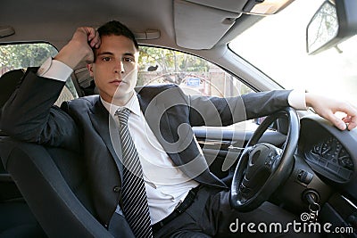 Young suit businessman inside his car Stock Photo