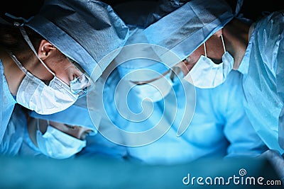 Young surgery team in the operating room Stock Photo