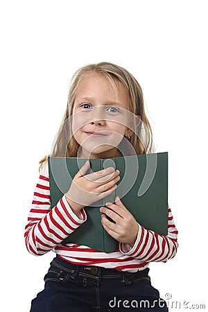 Young sweet little 6 or 7 years old with blond hair girl holding Stock Photo