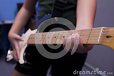 Young teen playing guitar Stock Photo