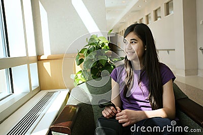 Young teen waiting Stock Photo