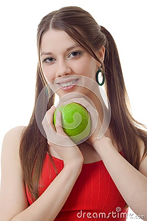 Young teen woman pigtails green apple Stock Photo