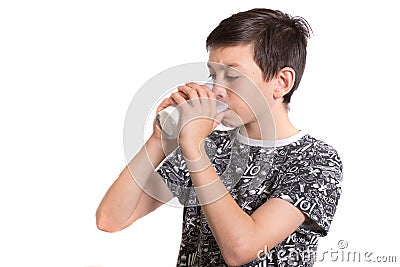 Young teenage boy drinking milk Stock Photo