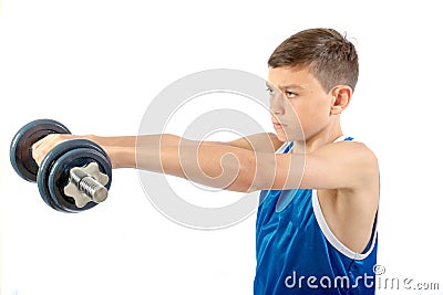 Young teenage boy using dumbbells Stock Photo