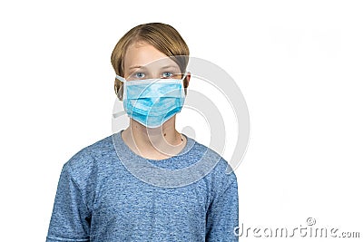 Young teenage boy wearing a protective mask. Isolated on white Stock Photo