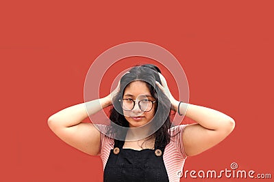 Young teenage woman suffers headache from depression Stock Photo