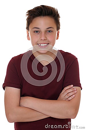 Young teenager boy portrait with folded arms Stock Photo