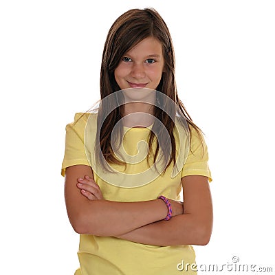 Young teenager girl portrait with folded arms Stock Photo