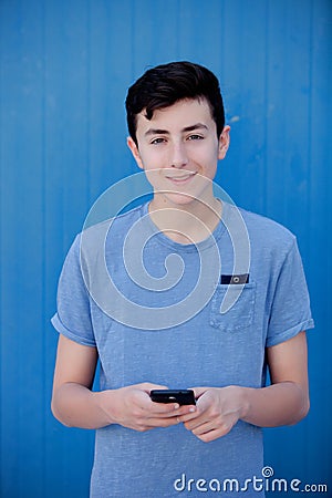 Young teenager with her cell phone Stock Photo