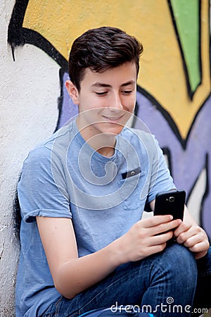 Young teenager with her cell phone Stock Photo