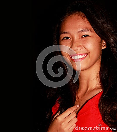 Young teenger Filipina wearing a smile Stock Photo