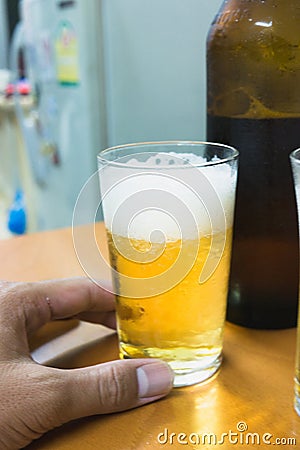 Young teens are happy to have a beer after the hard work Stock Photo