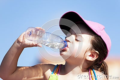 Young girl drinking water Stock Photo