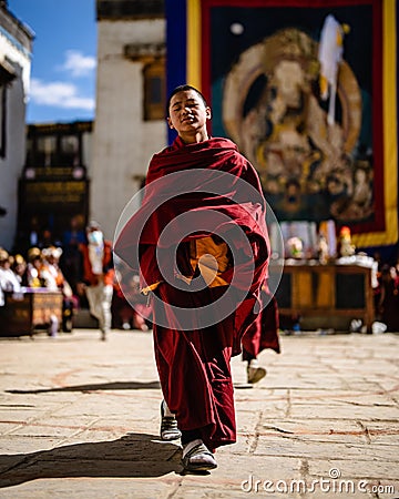 Young Tibetan Buddhist Monk at the ancient Tiji Festival in walled city of Lo Manthang, Nepal Editorial Stock Photo