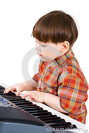 Young toddler stu to play music Stock Photo