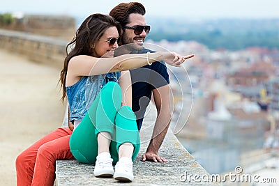 Young tourist couple looking at the views in the city. Stock Photo