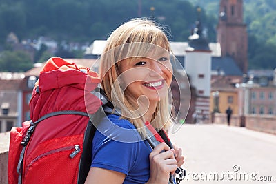 Young tourist in Europe laughing at camera Stock Photo