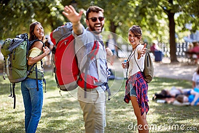 Young tourists posing in a park Stock Photo